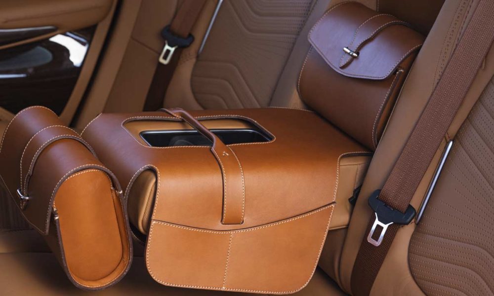 Aston-Martin-DBX_interior_rear_seats_saddle_bag